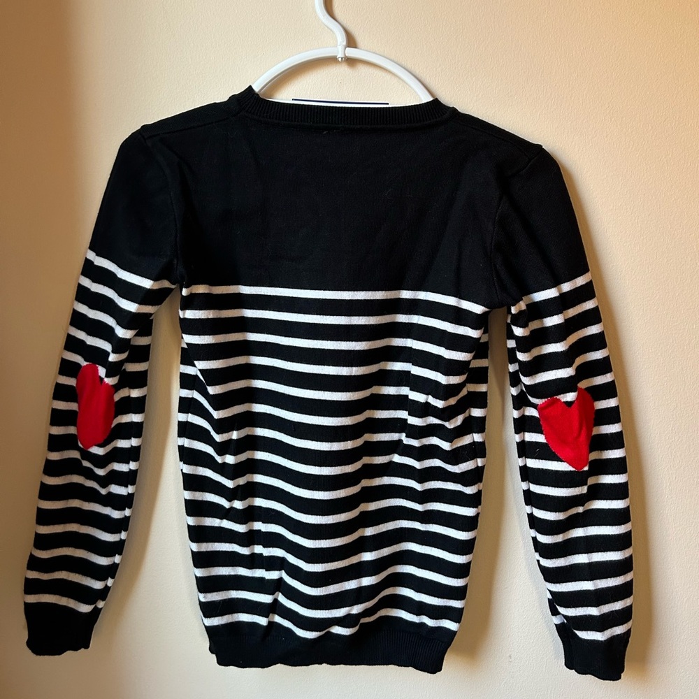 Striped sweater with heart elbow patches